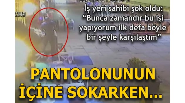 Çaldığı balığı pantolonun içine sakladı