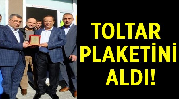 Toltar plaketini aldı!